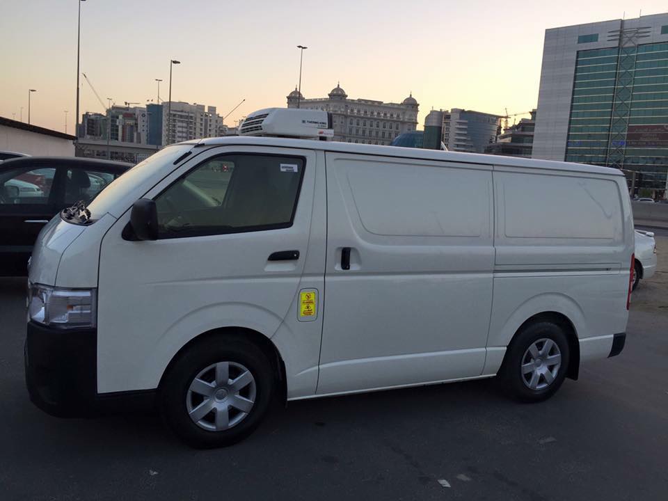 Toyota Hiace chiller van at dusk in Dubai