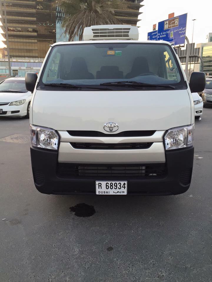 Toyota Hiace chiller van front view Dubai plate R68934